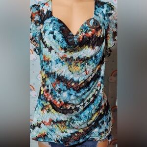 Draped shirt with distressed wooden bead